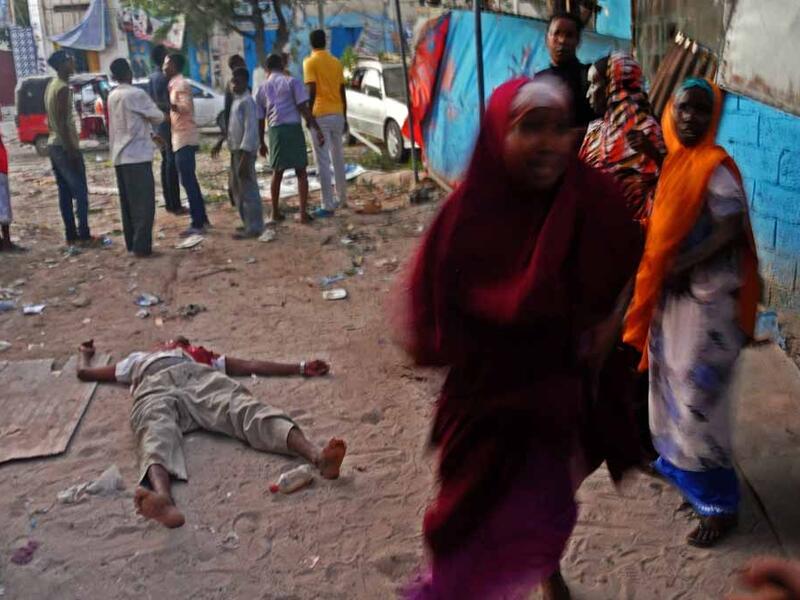'You probably think that after years of photographing death and destruction, the attacks would stop affecting me. But it’s not true,' AFP photojournalist Mohamed Abdiwahab reflects on covering Mogadishu.  (AFP/Mohamed Abdiwahab)