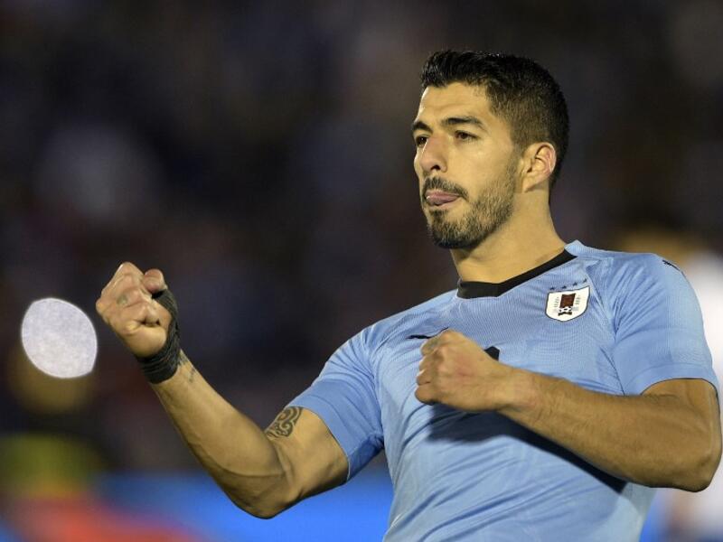  Russia are into the next round of the World Cup, with Egypt and Saudi Arabia out, after Uruguay earned a Group A victory. 