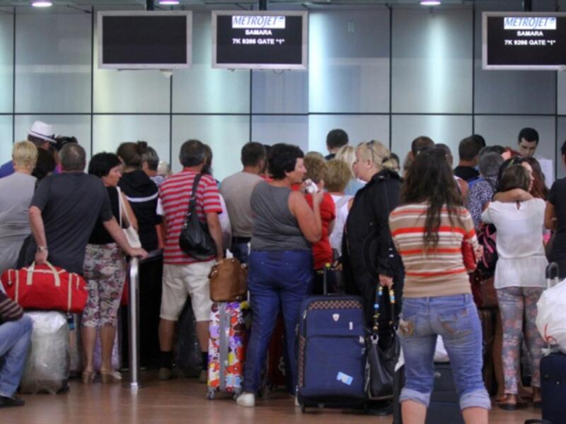 Tourists wait inside the airport in Egypt's Red Sea resort of Sharm el-Sheikh. (AFP/File)