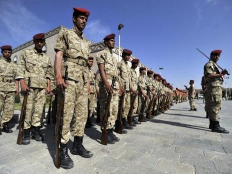 Wednesday's suicide bomb death was preceded earlier last week by bomb attacks that killed more than 50 people stationed at a southern Yemen military base. Army personnel pictured here participated in a funeral for the dead soldiers earlier this week (AFP)
