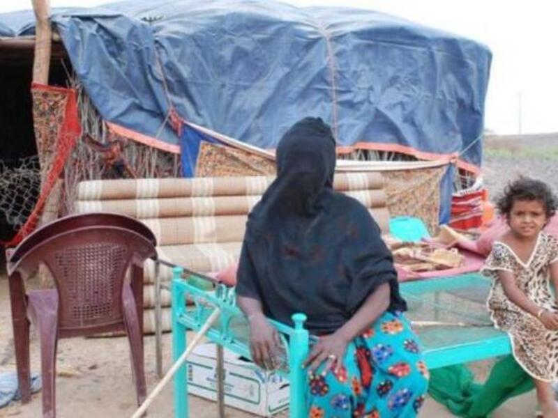 Umm Ali lives in a straw hut without electricity with her seven children 