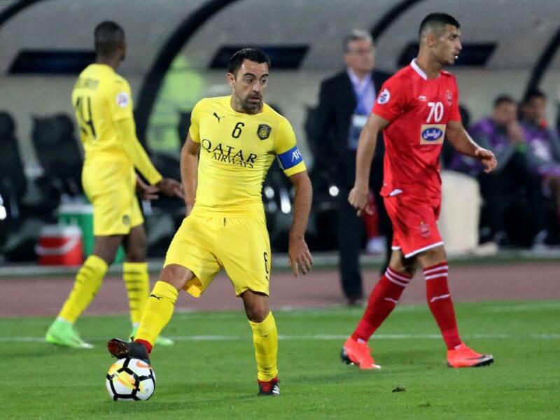 تشافي قائد السد خلال مباراة فريقه أمام بيرسيبوليس ضمن إياب نصف نهائي دوري أبطال آسيا، وهو اللقاء الذي انتهى بالتعادل الإيجابي ليخطف الفريق الإيراني بطاقة التأهل إلى نهائي البطولة.