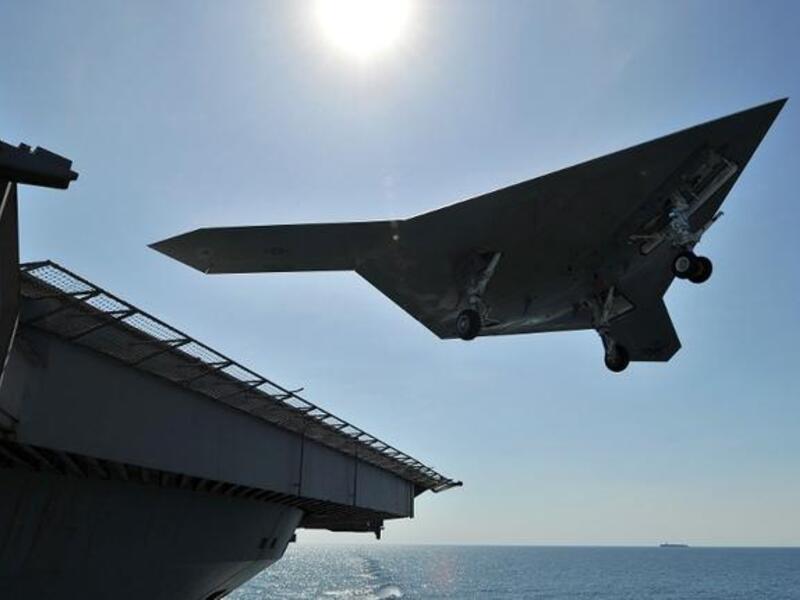 An unmanned drone carries out a touch go landing in the Atlantic (US Navy/AFP)