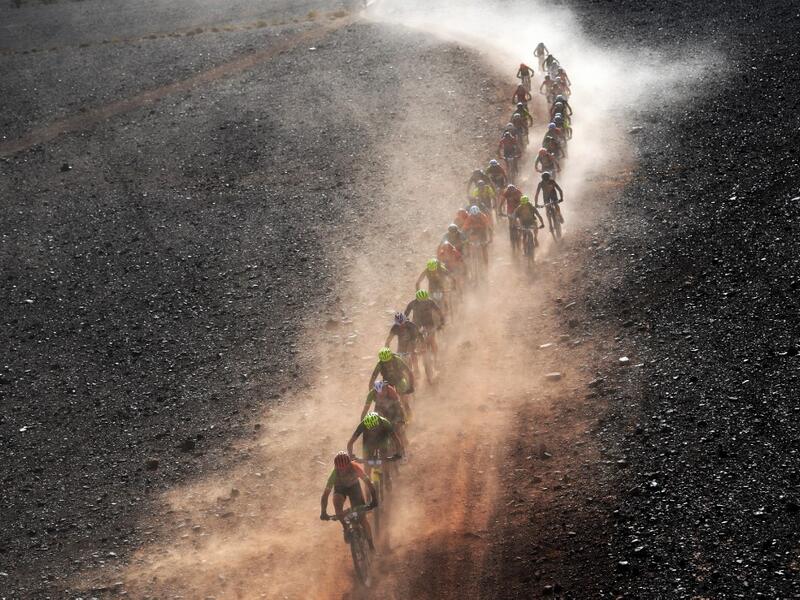 Competitors ride their bikes during Stage 4 of the 14th edition of Titan Desert 2019 mountain biking race between Merzouga and M’ssici, in Morocco, on May 1, 2019.  FRANCK FIFE / AFP