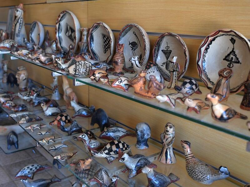 Pottery crafted in Sejnane is displayed at a souvenir shop in the Tunisian capital Tunis. FETHI BELAID / AFP