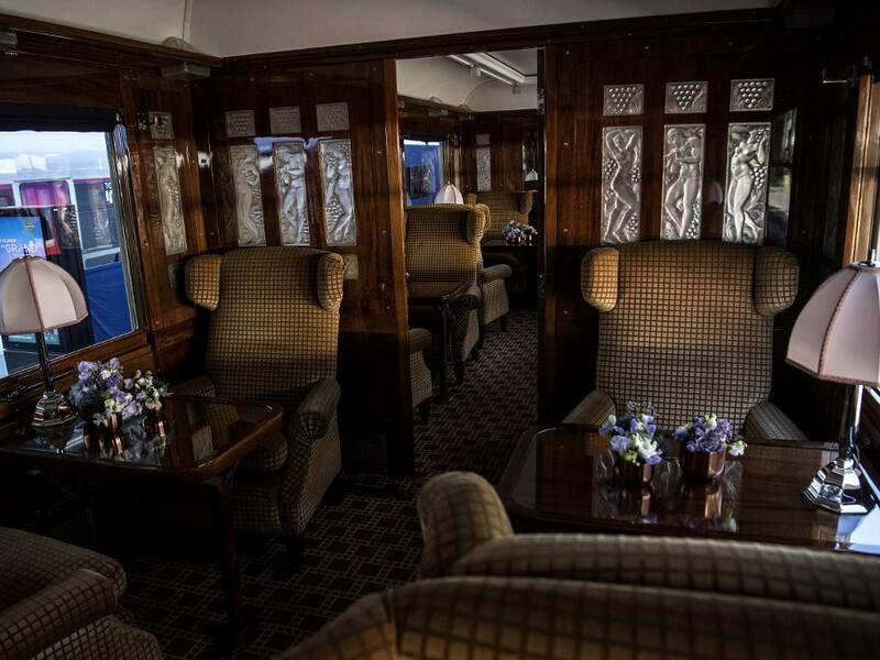 This picture taken on May 13, 2019 shows the interior of a carriage in a restored carriage of an Orient Express train displayed at the Gare de l'Est train station in Paris.  Christophe ARCHAMBAULT / AFP