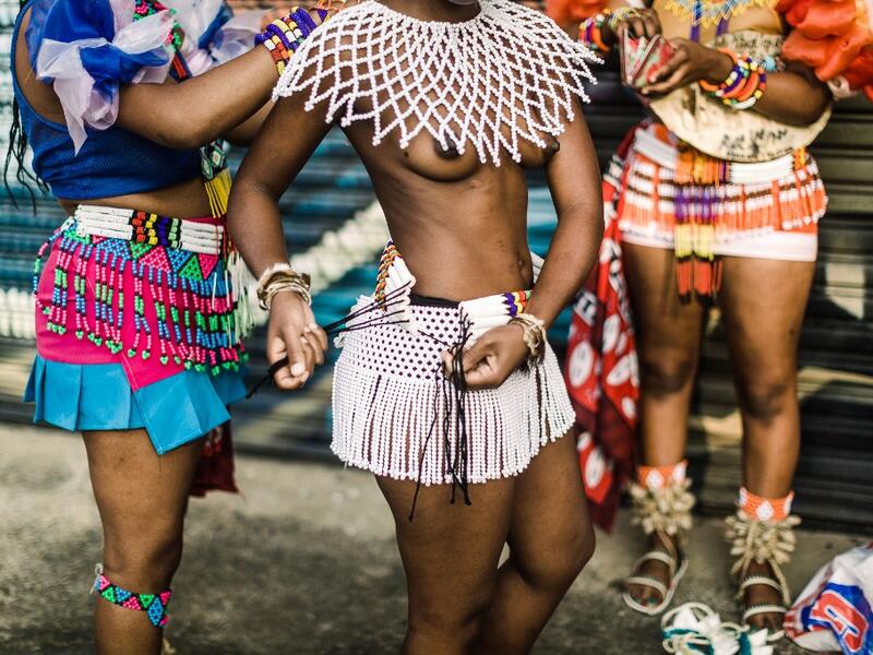 Young women dress up in traditional attire before taking part in auditions organised by the Indoni Culture School in the South African city of Durban. Rajesh JANTILAL / AFP