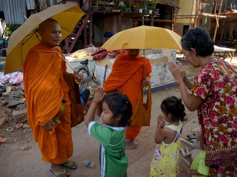 Graveyards may traditionally be the eternal resting place for the dead, but one cemetery in Phnom Penh is increasingly becoming a place to stay for the living as land disputes plague the nation’s poor.  TANG CHHIN Sothy / AFP