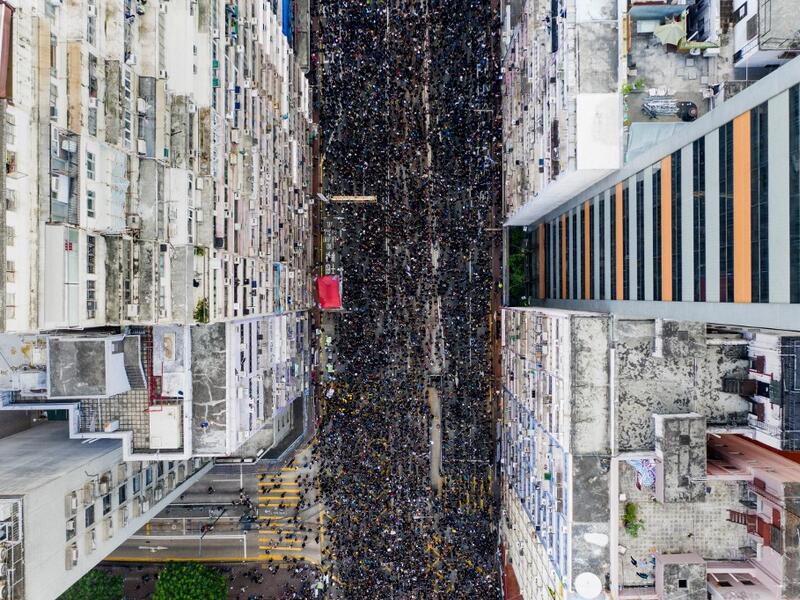 Tens of thousands of people rallied in central Hong Kong on June 16 as public anger seethed following unprecedented clashes between protesters and police over an extradition law, despite a climbdown by the city's embattled leader. STR / AFP