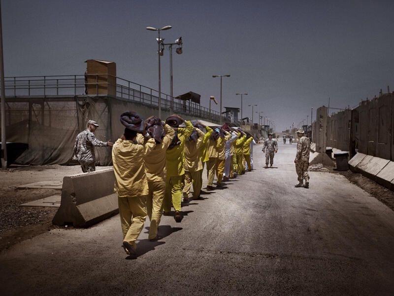 شغل  منصب شرعي عام في تنظيك القاعدة، حتى اعتقلته القوات الأمريكية عام 2003 في سجن بوكا في مدينة البصرة.