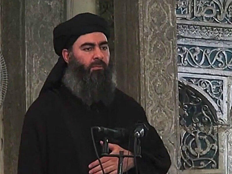 وفي سجن بوكا التقى الأستاذ بالبغدادي حيث يُعتقد أن الأخير استغل قدراته كـ"داعية" وتمكن من تجنيد المئات من السجناء لتنظيمه المتطرف، وكون ما سمَّاه بـ"دولة الخلافة". 