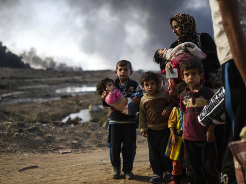 Some of the Iraqi people being displaced in their homes in Nineveh province. /AFP