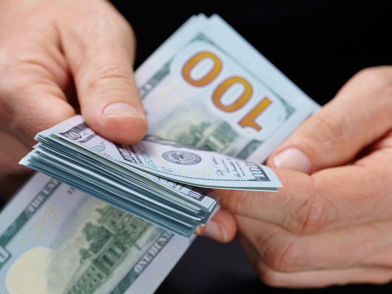The Fed lowered its short-term lending rate to between 1.5% and 1.75% from 1.75% to 2%, citing a "moderate rate" of economic growth.