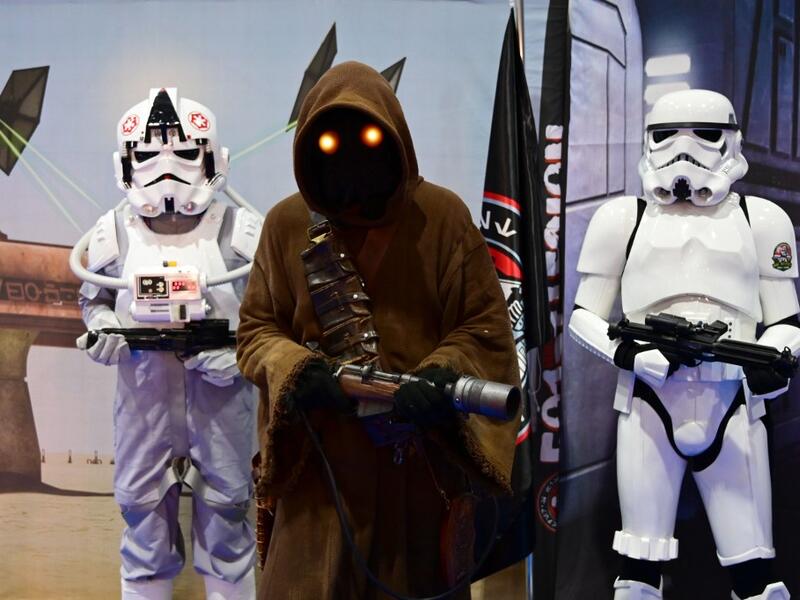 Cosplayers attend the Middle East Film & Comic Con on April 13 , 2019, in Dubai.  GIUSEPPE CACACE / AFP