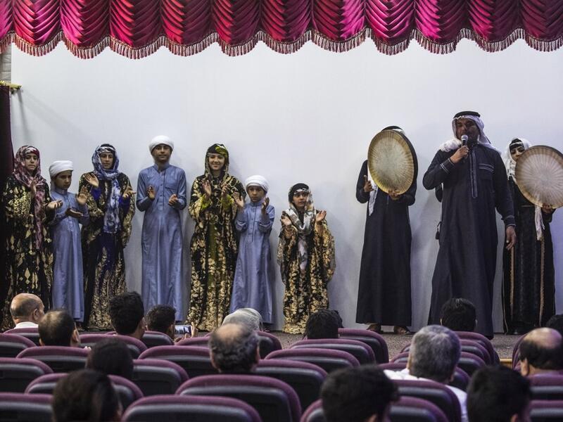 Members of a traditional music and dance group perform at the first cultural centre to open since ISIS ended  its rule in the eastern Syrian city of Raqa on May 1, 2019. DELIL SOULEIMAN / AFP
