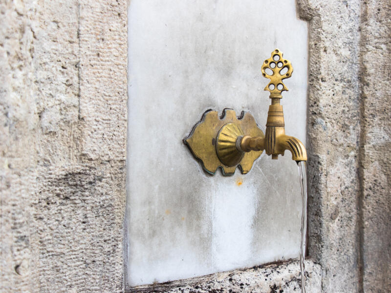 Turkish Ottoman style water tap at the ablution fountain in the courtyard of Fatih mosque. (Shutterstock/ File Photo)