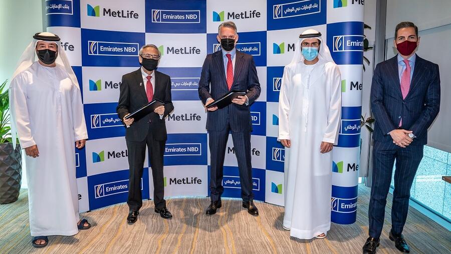 بنك الإمارات دبي الوطني يوقع اتفاقية شراكة استراتيجية مع متلايف  لتقديم حلول ومنتجات التأمين لعملائه