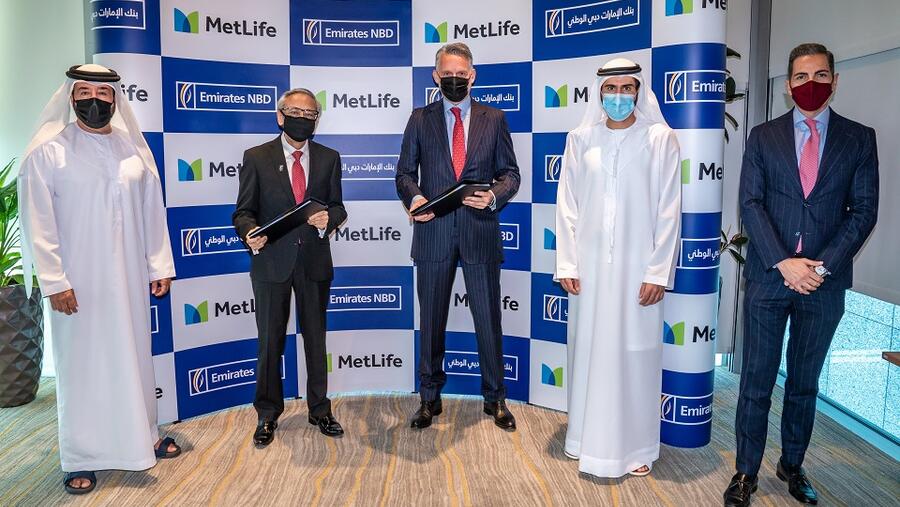 بنك الإمارات دبي الوطني يوقع اتفاقية شراكة استراتيجية مع متلايف  لتقديم حلول ومنتجات التأمين لعملائه