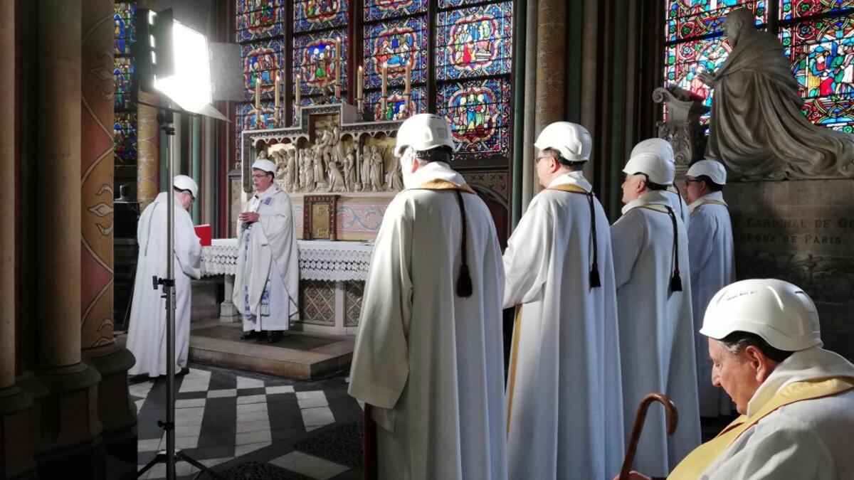 The Archbishop of Paris Michel Aupetit, holds the first mass in a side chapel two months to the day after a devastating fire engulfed the Notre-Dame de Paris cathedral on June 15, 2019, in Paris. The Notre-Dame cathedral in Paris will host its first mass on June 15, 2019. Karine PERRET / POOL / AFP