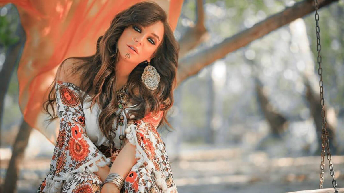 In her latest photos Fawakherji appeared in bright colored clothes and wavy hair Source sulaffawakherji Instagram