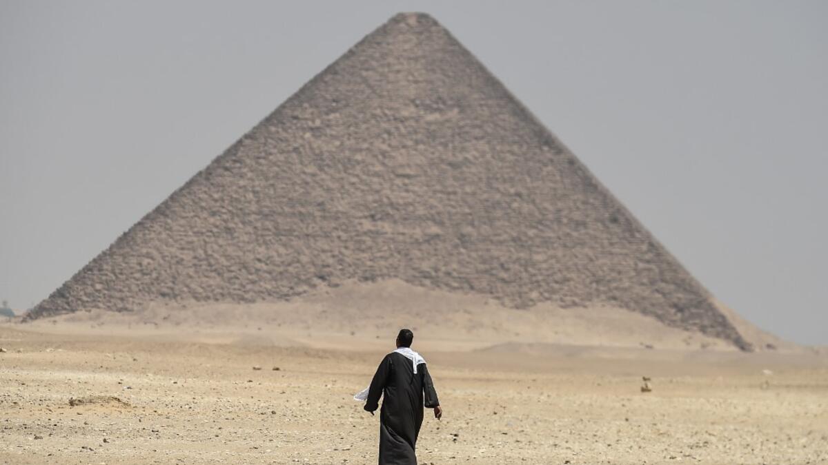 Egyptian archaeologists unveiled Saturday several sarcophagi with some containing well-preserved mummies, along with the remains of an ancient wall dating to the Middle Kingdom nearly 4,000 years ago. The finds were made during excavation work in the ancient royal necropolis of Dahshur on the west bank of the Nile River, south of Cairo. Mohamed el-Shahed / AFP