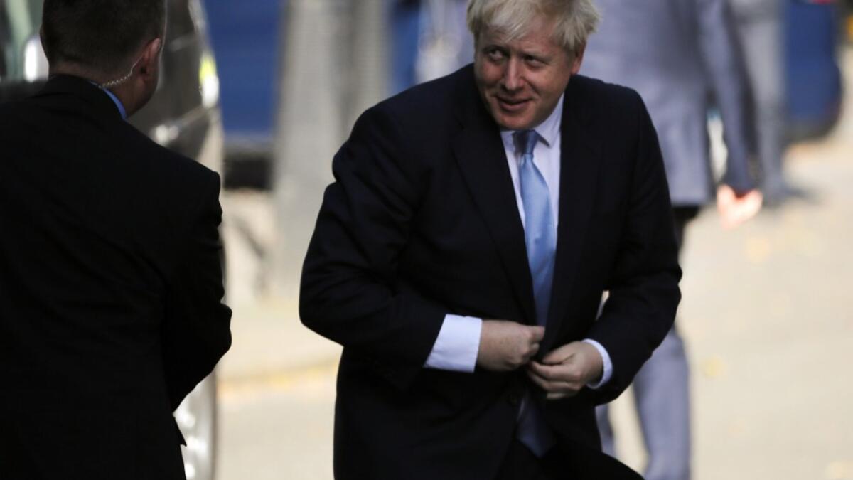 Britain's new prime minister Boris Johnson returns from Parliament to number 10 Downing Street in London on July 24, 2019. Tolga AKMEN / AFP