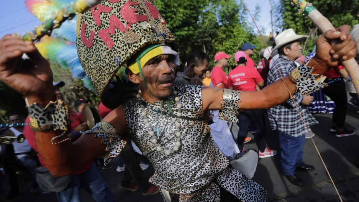 Catholic faithful takes part in the opening of the ten-day celebration of the Santo Domingo de Guzman festival in Managua, on August 1, 2019.  INTI OCON / AFP