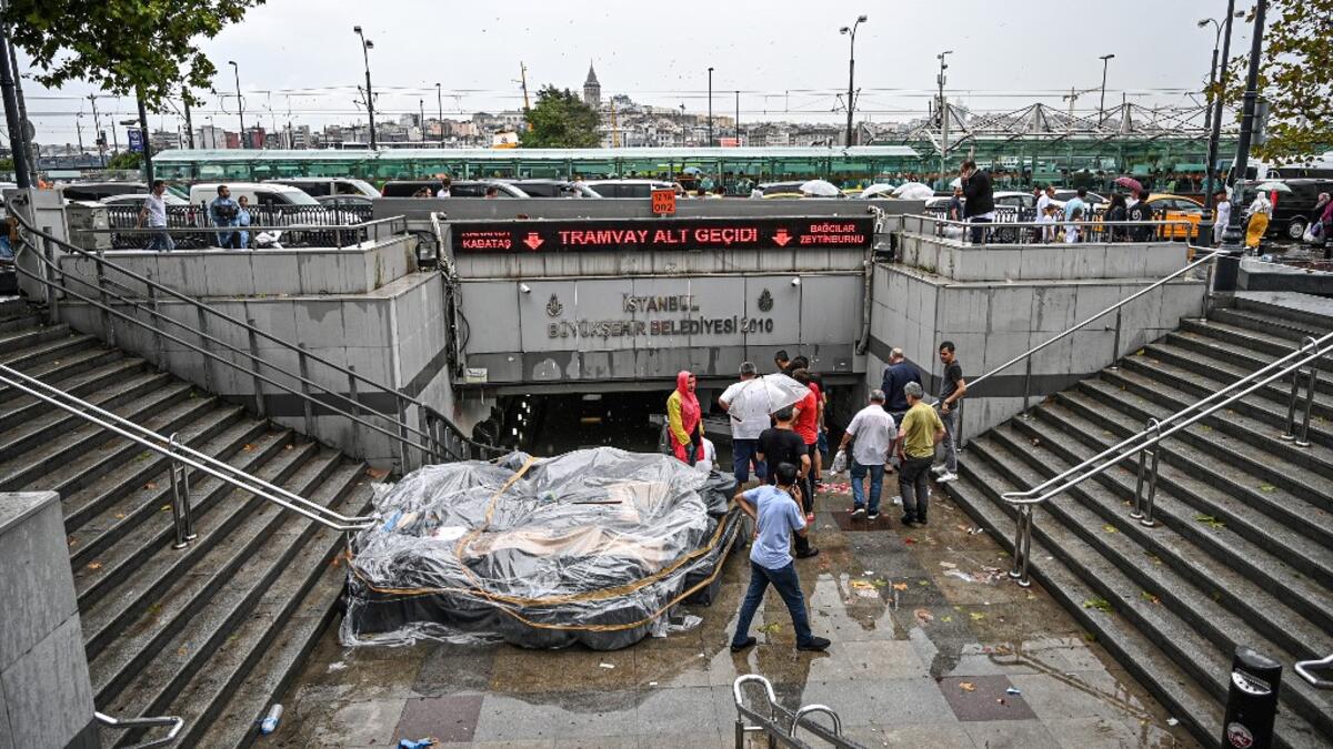 Turkey's mega city Istanbul was lashed by a heavy rainstorm on August 17, killing a homeless man and leaving parts of the historic Grand Bazaar flooded.  Ozan KOSE / AFP