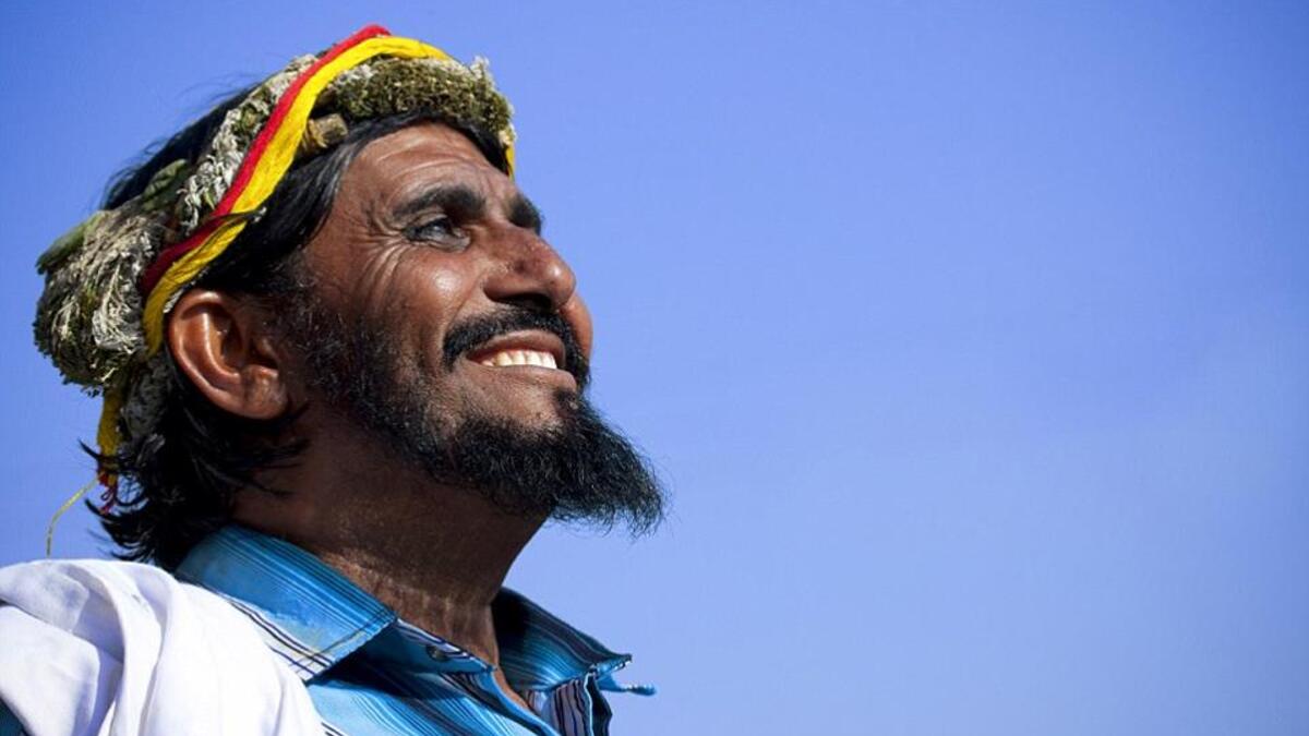 Garlands made exclusively for medicinal purposes, such as the one this man is wearing, are less pretty and stuffed with herbs (Facebook)