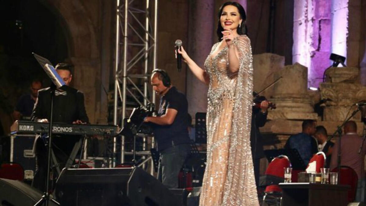 Diana Karazon chose a silver and beige dress for her concert in Jerashs southern theater Source dianakarazonw Instagram