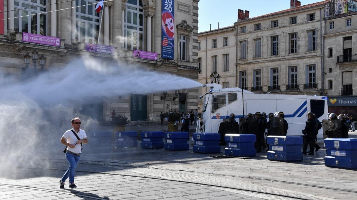French anti-riot police officers use a water canon during an anti-government demonstration called by the "Yellow Vests" (Gilets Jaunes) movement on September 7, 2019 in Montpellier, southern France. Pascal GUYOT / AFP