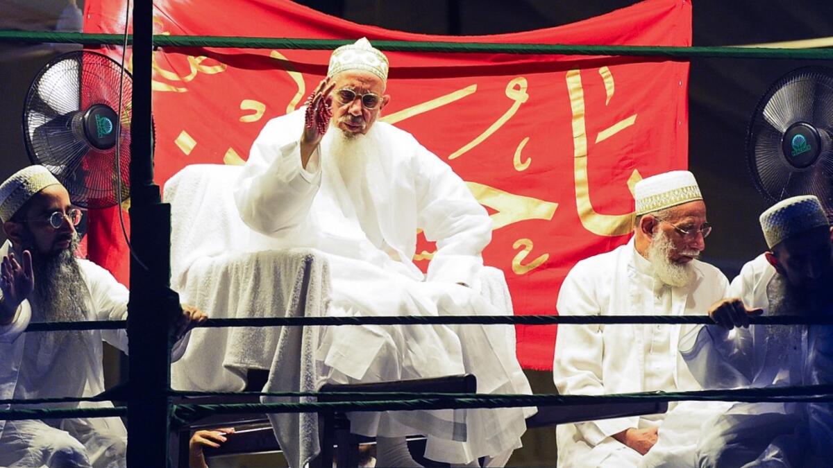 The Spiritual leader of Dawoodi Bohra Muslims, Syedna Mufaddal Saifuddin (C) takes part in a Bohra ceremony in Colombo in the run up to Ashura, one of the holiest days in Shiite Islam and commemorates the 7th century martyrdom of Prophet Mohammed’s grandson.  ISHARA S. KODIKARA / AFP