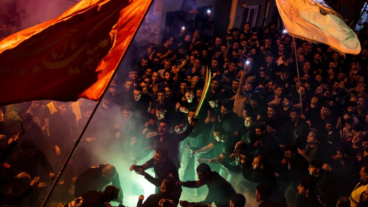 Ashura commemorates the killing of Imam Hussein, a grandson of the Prophet Mohammed, by armies of the caliph Yazid in 680 AD. Tradition holds that the revered imam was decapitated and his body mutilated in the Battle of Karbala. Yasin AKGUL / AFP