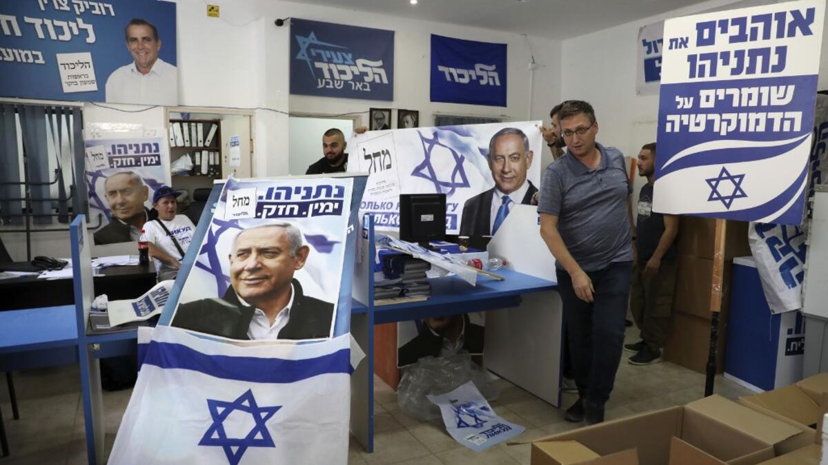 A picture taken on September 15, 2019 shows the electoral campaign headquarters for the Likud party, displaying banners of chairman and Israeli Prime Minister Benjamin Netanyahu in the southern Israeli city of Beersheva on September 15, 2019. HAZEM BADER / AFP