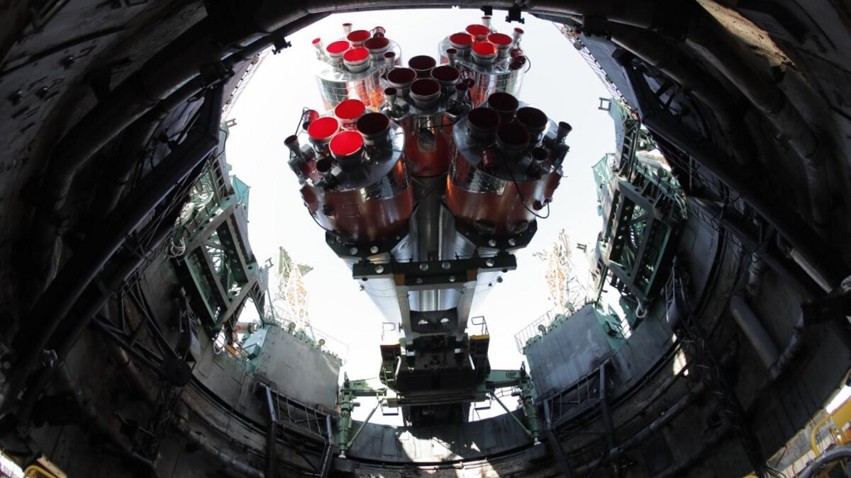 The Soyuz booster rocket FG with Soyuz MS-15 spacecraft is mounted on the launch pad at the Russian-leased Baikonur cosmodrome in Kazakhstan on September 23, 2019. MAXIM SHIPENKOV / POOL / AFP