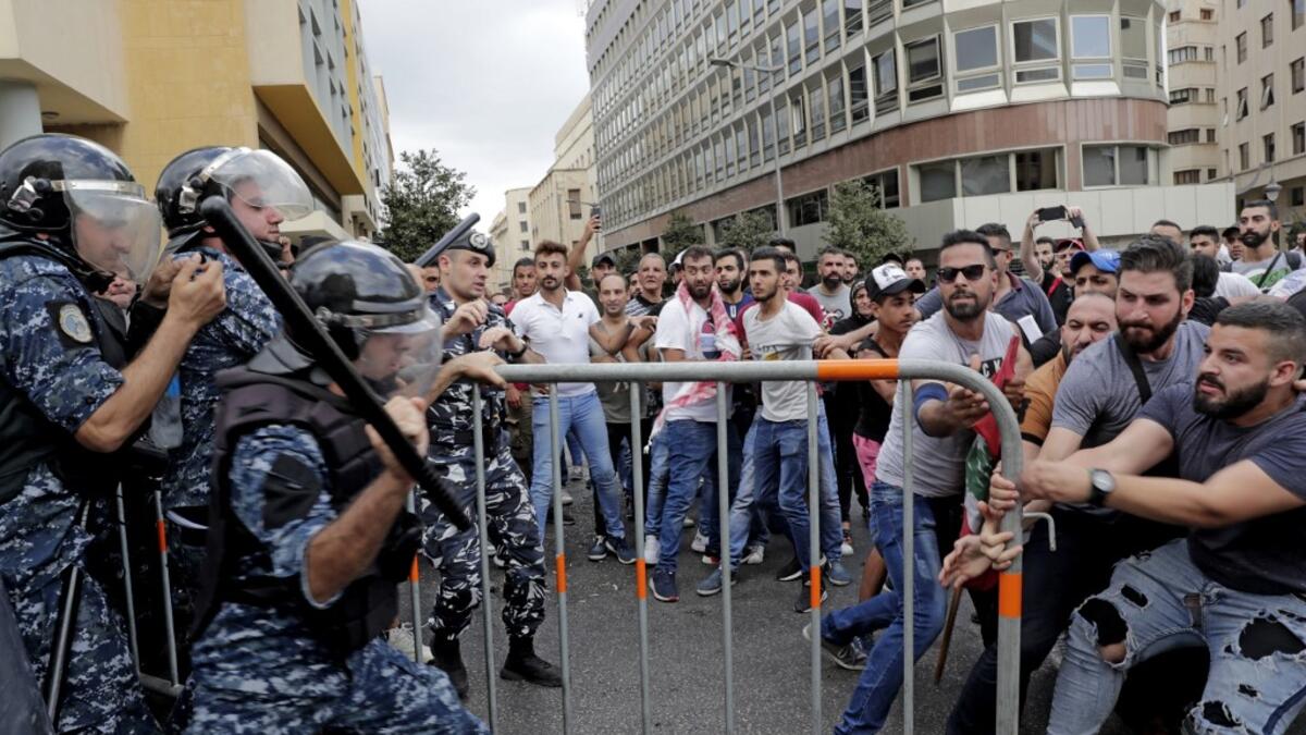 Lebanese protested in the capital over increasingly difficult living conditions, amid fears of a dollar shortage and possible price hikes. ANWAR AMRO / AFP