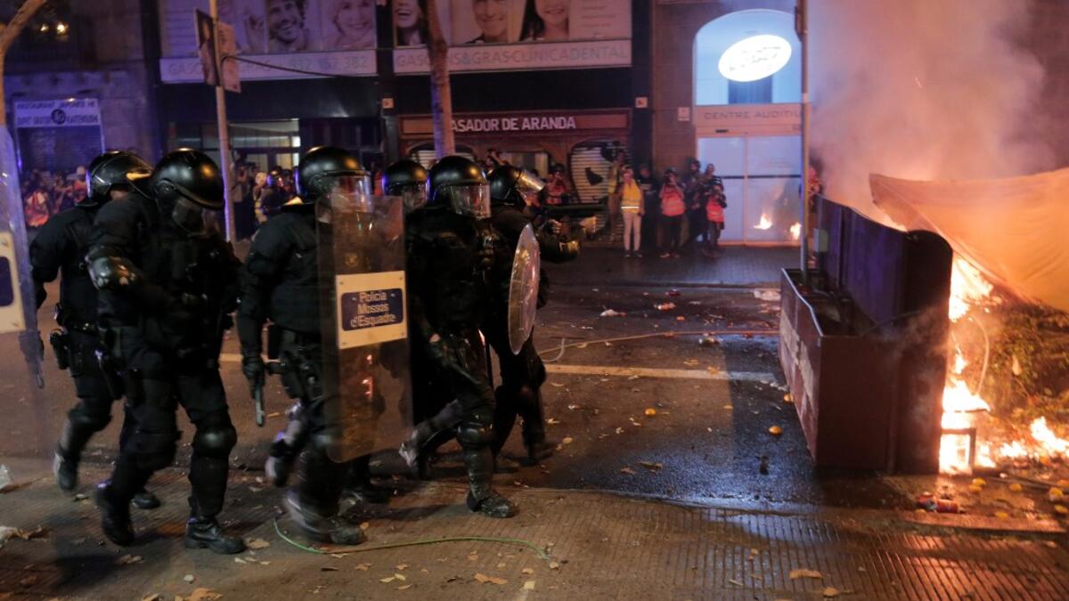 The deterioration came on the fifth consecutive day of protests in the Catalan capital and elsewhere over a Spanish court's jailing of nine separatist leaders on sedition charges over a failed independence bid two years ago Pau Barrena / AFP