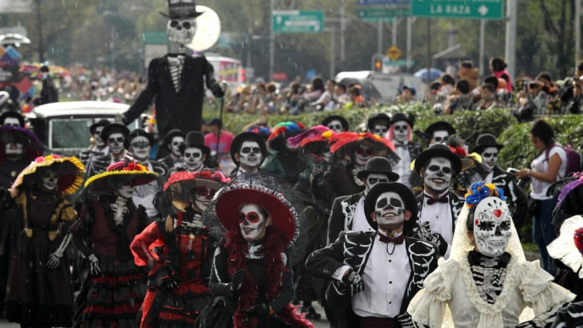 People take part in the Day of the Dead parade in Mexico City Ulises Ruiz/AFP/Getty Images