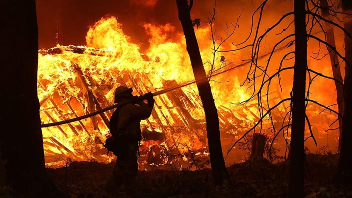 Nine people were declared dead and tens of thousands evacuated Friday as fierce wildfires raged across the western US state of California. (AFP/ File)