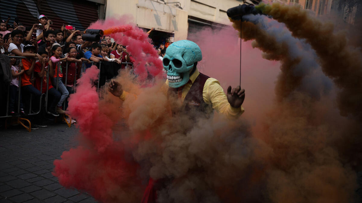 Participants in costume perform during the annual International Day of the Dead Parade in Mexico City  Emilio Espejel / Anadolu Agency / Getty