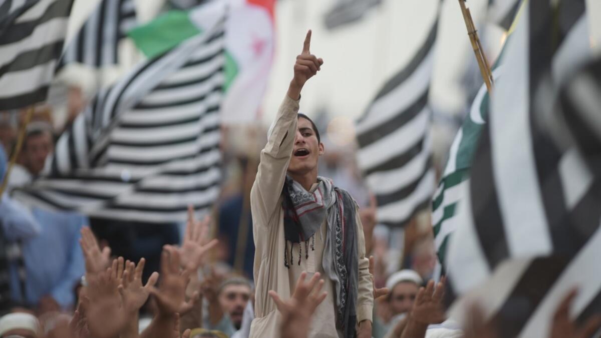 Activists of Islamic political party Jamiat Ulema-e-Islam (JUI) chant slogans during an anti-government "Azadi (Freedom) March" in Islamabad on November 2, 2019. FAROOQ NAEEM / AFP