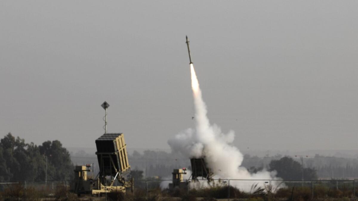 Air raid sirens sounded in the southern Israeli towns near the Gaza Strip border. Since Israel's targeted killing of Islamic Jihad commander Baha Abu al-Ata on November 12 in the morning, at least 220 rockets have been fired at Israel from Gaza without causing any deaths, the military said. Israeli air defences intercepted 90 percent of the rockets, it added.  MENAHEM KAHANA / AFP