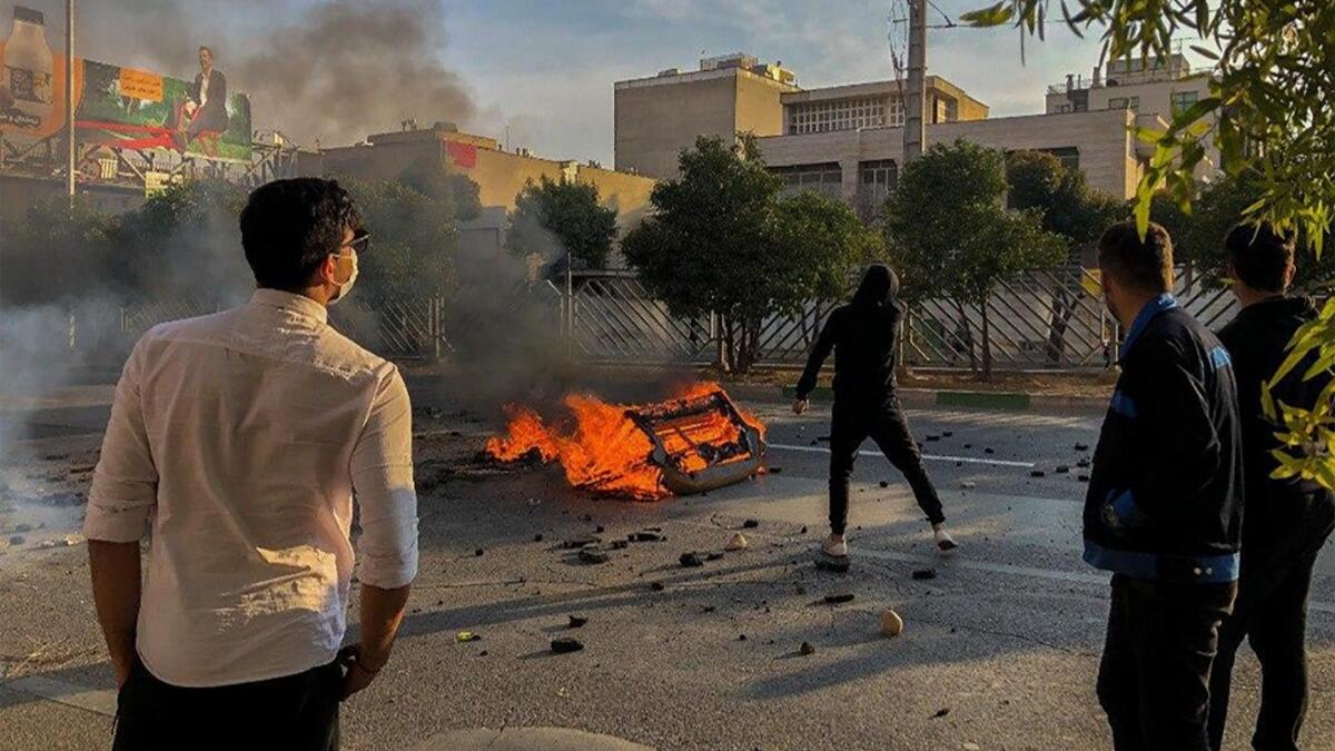 One person was killed and others injured in protests across Iran, hours after a surprise decision to increase petrol prices by 50 percent for the first 60 litres and 300 percent for anything above that each month, and impose rationing. AFP