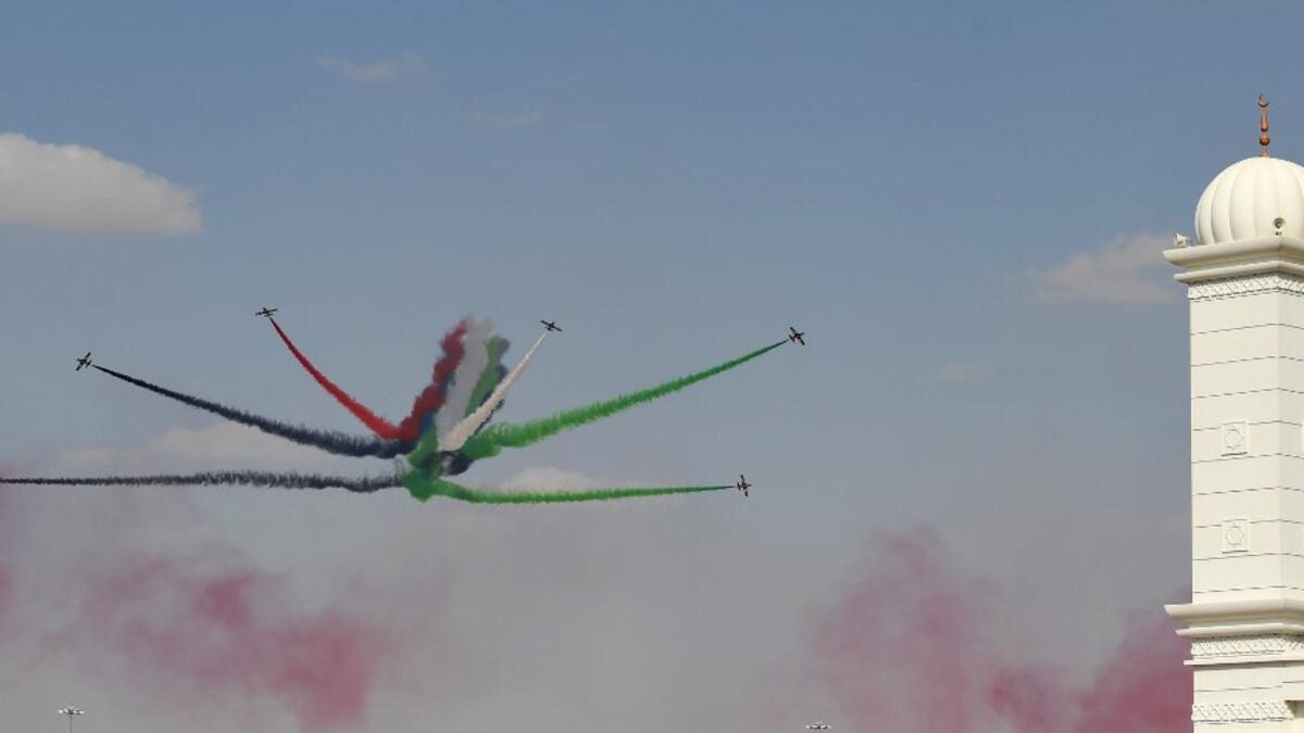 United Arab Emirates' air force Aerobatic Team, Al-Fursan, performs stunts at the Dubai Airshow on November 18, 2019. KARIM SAHIB / AFP