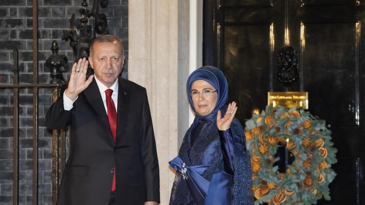 Turkish President Recep Tayyip Erdogan and his wife Emine arrive at 10 Downing Street in central London on December 3, 2019, to attend reception hosted by Britain's Prime Minister Boris Johnson ahead of the NATO alliance summit. NATO leaders gather Tuesday for a summit to mark the alliance's 70th anniversary but with leaders feuding and name-calling over money and strategy, the mood is far from festive. Niklas HALLE'N / AFP