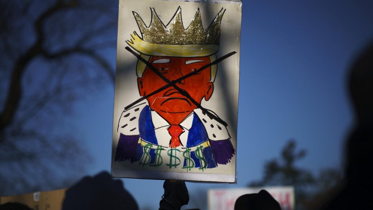 Protesters supporting the impeachment of U.S. President Donald Trump gather outside the U.S. Capitol December 18, 2019 in Washington, DC. Later today the U.S. House of Representatives is expected to vote on two articles of impeachment against Trump charging him with abuse of power and obstruction of Congress. Drew Angerer/Getty Images/AFP