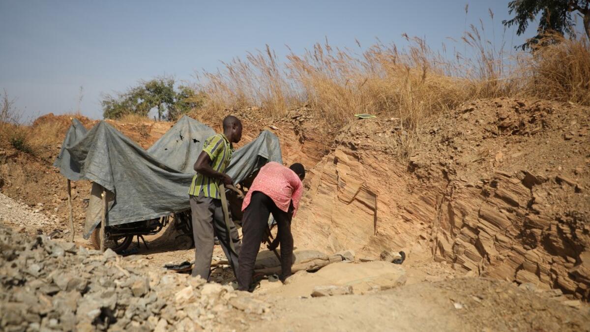 But in recent years their trade has become increasingly unsafe. The mines lie within the reach of heavily-armed groups -- dubbed "bandits" by the local authorities -- that have been terrorising this remote region.  Kola Sulaimon / AFP