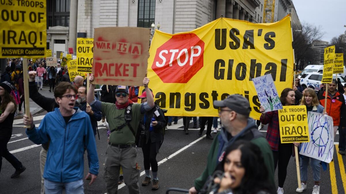 Anti-war activist march from the White House to the Trump International Hotel in Washington, DC, on January 4, 2020. ANDREW CABALLERO-REYNOLDS / AFP