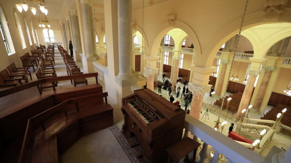 Guests visit the newly renovated Eliyahu Hanavi synagogue in the northwestern Egyptian city of Alexandria on January 10, 2020, on the day of its inauguration. The synagogue, boasting green and violet stained glass windows and towering marble columns, was built in its current form in 1850 by an Italian architect on top of the original edifice dating back to 1354. Khaled DESOUKI / AFP