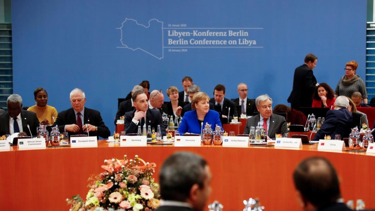 German Chancellor Angela Merkel (4thL) is flanked by German Foreign Minister Heiko Maas (3rdL) and Secretary-General of the United Nations (UN) Antonio Guterres (2ndR) as African Union (AU) Committee Chairman Moussa Faki (L) and European Union High Representative for Foreign Affairs and Security Policy Josep Borrell (2ndL) look on at the start of a Peace summit on Libya at the Chancellery in Berlin, on January 19, 2020. World leaders gather in Berlin on January 19, 2020. HANNIBAL HANSCHKE / POOL / AFP